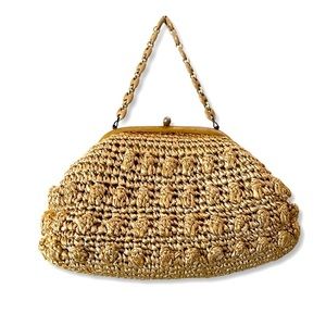 Vintage ‘60’s straw purse with clamshell closure and mod chain handle‎